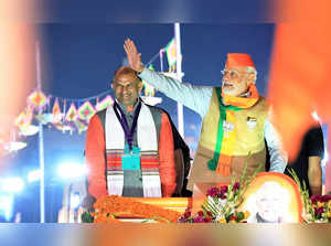 Jaipur: Prime Minister Narendra Modi with Rajasthan BJP President C.P. Joshi dur...