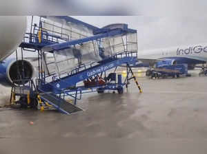 **EDS: GRAB VIA PTI VIDEO** Chennai: Chennai Airport runway inundated amid inces...