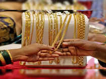 Gold Rate Today: Yellow metal drops Rs 1,800 from historic highs on MCX. Time to buy or sell?
