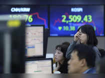 Asian shares slip with Wall Street, oil helps boost bonds