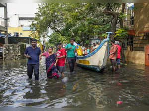 Chennai: People being rescued and shifted to a safer place amid floods after hea...