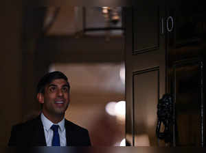 Britain's Prime Minister Rishi Sunak exits 10 Downing Street, in London, on December 7, 2023 to greet the outgoing Dutch Prime Minister, ahead of their metting.