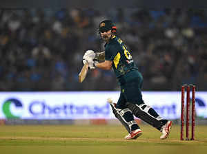 Australia's Travis Head watches the ball after playing a shot during the fourth Twenty20 international cricket match between India and Australia at the Shaheed Veer Narayan Singh International Cricket Stadium in Raipur on December 1, 2023.