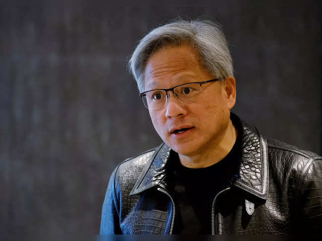 FILE PHOTO: NVIDIA’s CEO Jensen Huang attends a media roundtable meeting in Singapore