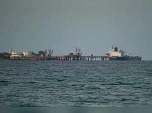 FILE PHOTO: FILE PHOTO: Tanker carrying barrels of Russian fuel oil delivers its cargo in Matanzas, Cuba