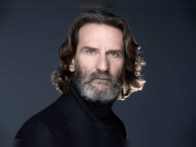French writer Frederic Beigbeder poses during a photo session in Paris, on January 7, 2022.