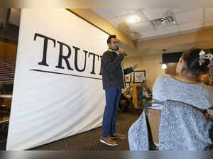 Entrepreneur and 2024 Presidential hopeful Vivek Ramaswamy speaks at a local restaurant during a visit in Cherokee, Iowa, on December 9, 2023, ahead of the Iowa caucus.