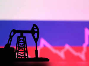 FILE PHOTO: Illustration shows Russian flag, oil pump jack and stock graph