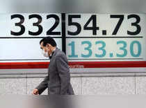 Japan's Nikkei gains on softer yen to snap two-week losing streak