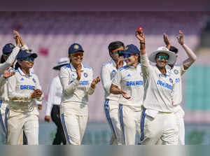Navi Mumbai: India Women's Deepti Sharma celebrates her five-wicket haul with te...