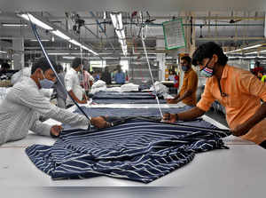 Garment workers cut