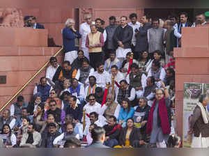 New Delhi: Suspended Opposition MPs protest during the Winter session of Parliam...