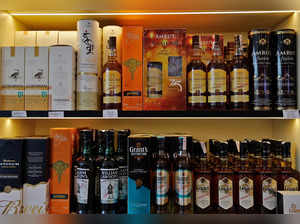Whisky bottles are kept for sale at a liquor shop in Gurugram