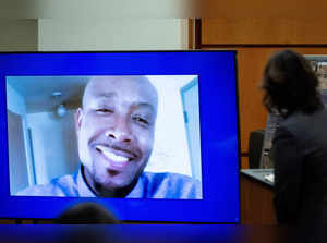 A photo of Manny Ellis is displayed