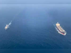 New Delhi, Dec 24 (ANI): The India-bound merchant vessel, MV Chem Pluto being es...