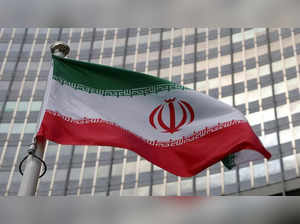 FILE PHOTO_ The Iranian flag flutters in front of the International Atomic Energy Agency (IAEA) organisation's headquarters in Vienna (1)