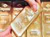 Gold glitter on global cues, jumps Rs 450