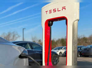FILE PHOTO: Tesla Supercharger station at a Tesla store in Ann Arbor, Michigan