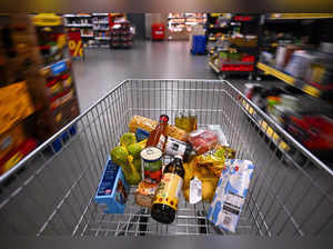 Food items lay in a shopping cart at a store of the Penny supermarket chain in Berlin, Germany, on August 1, 2023. German inflation slowed in July 2023 after rising in June 2023, official data showed, but remained at high levels. The annual inflation rate in Europe's largest economy fell to 6.2 percent, down from 6.4 percent in June 2023, federal statistics office Destatis said on July 28, 2023 in preliminary figures. Consumer prices in Germany were no longer rising as quickly as they did at the end of 2022 after Russia's invasion of Ukraine sent the costs of energy