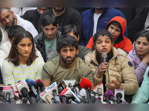 New Delhi: Wrestlers Vinesh Phogat, Sakshi Malik and Bajrang Punia address a pre...