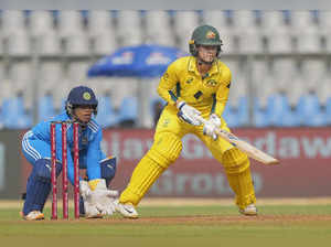 Mumbai: Australia's Phoebe Litchfield plays a shot during the third ODI cricket ...