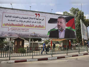 A billboard depicting Saleh al-Aruri, a senior leader of the Palestinian Hamas movement, is pictured in Gaza City on August 28, 2023