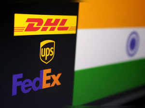 Illustration shows DHL, UPS, FEDEX logos and Indian flag