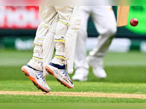 Australia's batsman Usman Khawaja has the names of his children written on his boots on the first day of the second cricket Test match between Australia and Pakistan at the Melbourne Cricket Ground (MCG) in Melbourne on December 26, 2023.