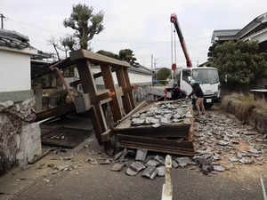 Death toll reaches 100 as survivors are found in homes smashed by western Japan earthquakes
