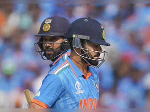 Ahmedabad: Indian batters Virat Kohli and Rohit Sharma run between the wickets d...