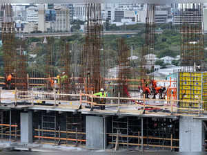 In an aerial view, construction workers build a residential building on January 05, 2024 in Miami, Florida.
