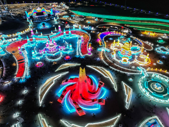 ​An aerial view shows illuminated ice sculptures at the Harbin Ice and Snow World in Harbin​.