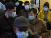 Spain considers nationwide hospital mask rule, as flu, COVID hit Europe