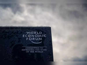 A photograph shows a sign of the World Economic Forum (WEF) in the alpine resort of Davos, on the opening day of the annual meeting in Davos on January 16, 2023.