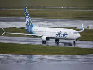 Alaska Airlines flight 1276, a Boeing 737-900, taxis before takeoff from Portlan...