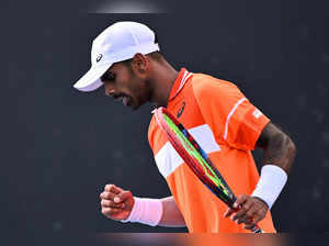 India's Sumit Nagal reacts after a point against Kazakhstan's Alexander Bublik during their men's singles match on day three of the Australian Open tennis tournament in Melbourne on January 16, 2024.