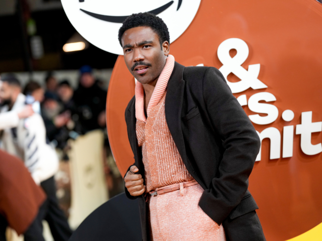 ​Donald Glover poses for photographers upon arrival at the premiere of the television series 'Mr. & Mrs. Smith' in London​.