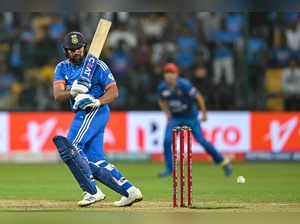 India's captain Rohit Sharma plays a shot during the super over of third and final Twenty20 international cricket match between India and Afghanistan at the M. Chinnaswamy Stadium in Bengaluru on January 17, 2024.