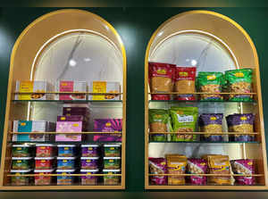 FILE PHOTO: A view shows packets of snacks on shelves inside a Haldiram's restaurant in Mumbai