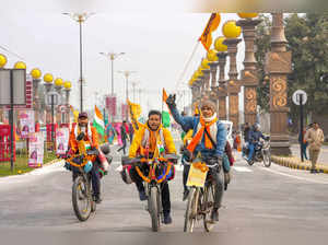 Ayodhya: Devotees arrive on cycles ahead of the consecration ceremony of Ram Man...