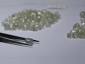FILE PHOTO: Diamonds are displayed during a visit to the De Beers Global Sightholder Sales (GSS) in Gaborone, Botswana