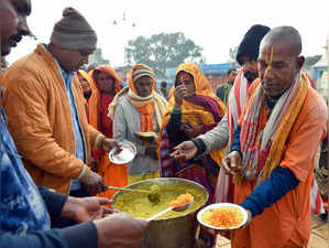 Ayodhya, Jan 17 (ANI): Devotees receive free food from Langar, in Ayodhya on Wed...