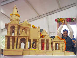 Sagar: Madhya Pradesh Chief Minister Mohan Yadav near a model of Ram Temple, at ...