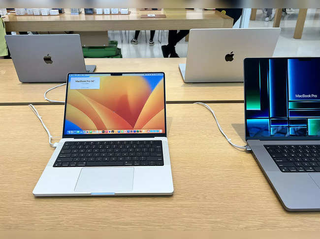 Apple laptop computers on display in an Apple store on May 04, 2023 in Miami, Florida.