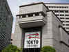 Japan's Nikkei scales 34-year peak on Wall Street record