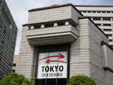 Japan's Nikkei scales 34-year peak on Wall Street record