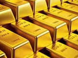 Gold stumbles on strong US data, as traders strap in for more