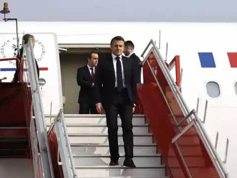 Who all came with Macron