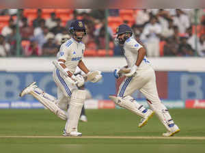 Hyderabad: India's captain Rohit Sharma and Yashasvi Jaiswal run between the wic...