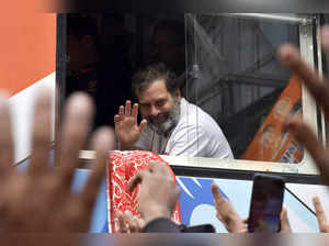 India's Congress party leader Rahul Gandhi waves to supporters during the 'Bharat Jodo Yatra' march in Guwahati on January 23, 2024.